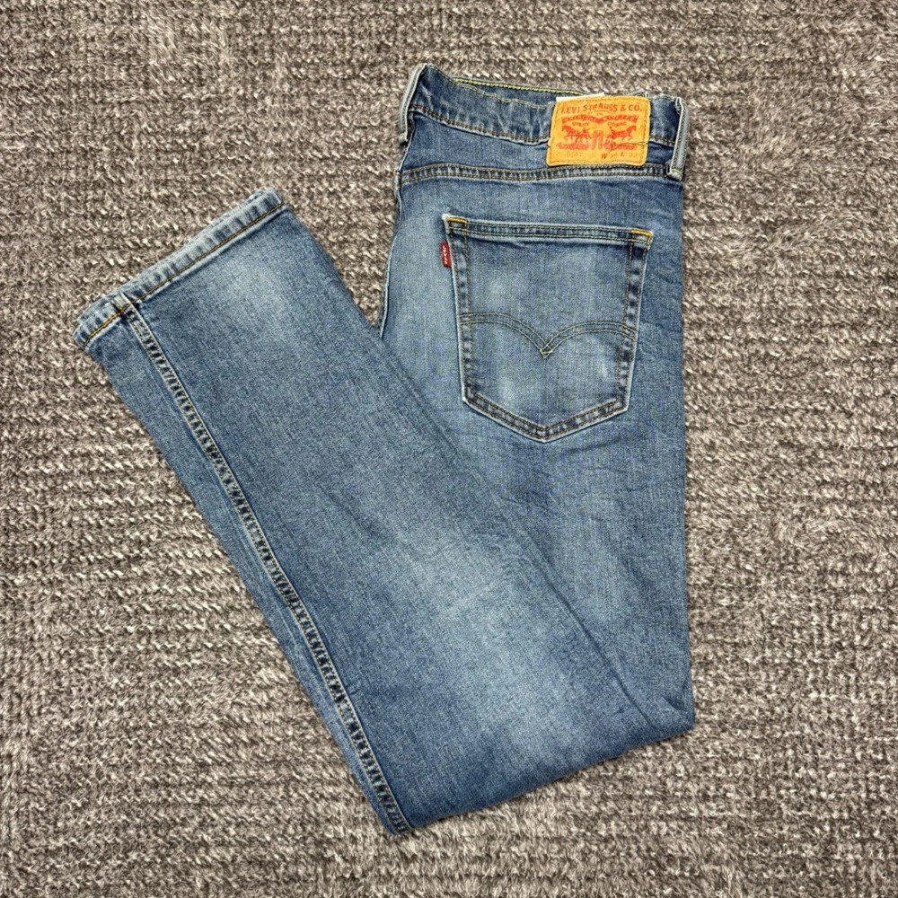Levis Mens 519 Jeans Size 34x32 Medium‎ Wash Blue Distressed Stretch